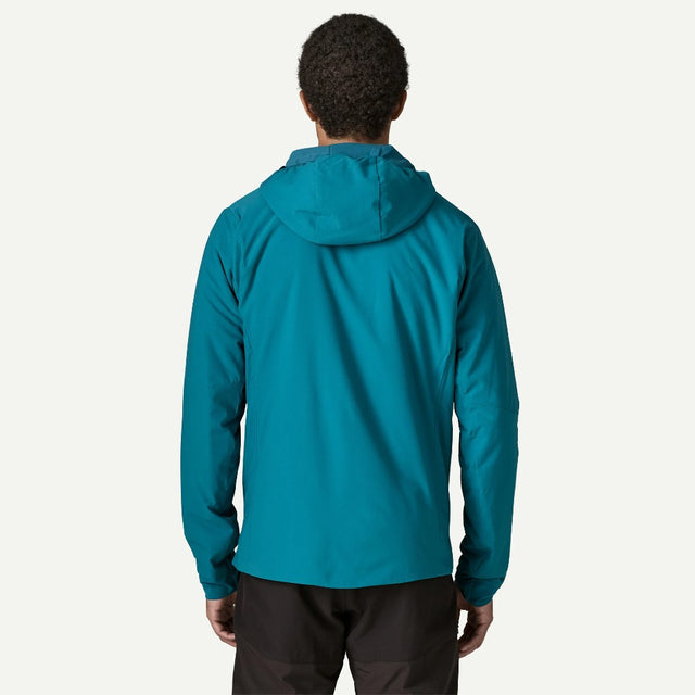 Back on-model view of Patagonia's Nano-Air light hoody men's in glacial blue colour