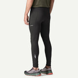 Back on-model view of Patagonia's Men's Peak Mission Tights 28" in black colour