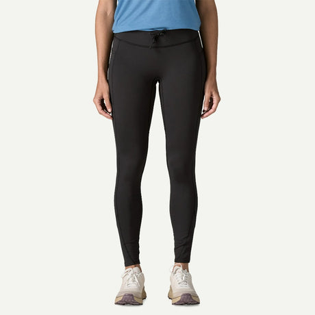 Front on-model view of Patagonia Peak Mission Tights Women's in black colour