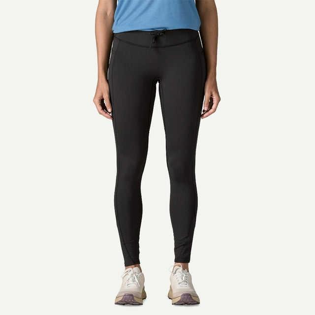 Front on-model view of Patagonia Peak Mission Tights Women's in black colour