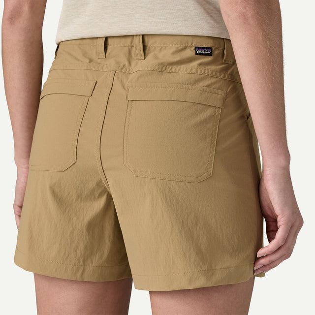 Back on-model view of Patagonia quandary 5" shorts women's in classic tan colour