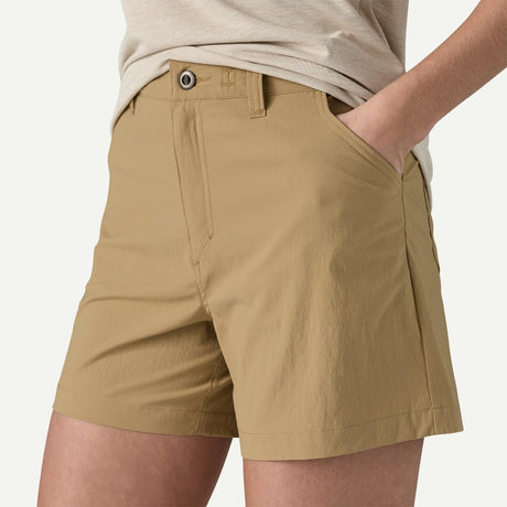 Pocket detail on-model view of Patagonia quandary 5" shorts women's in classic tan colour