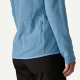 Zipper detail on-model view of Patagonia R1 Air Zip-Neck Women's in Shore Blue colour