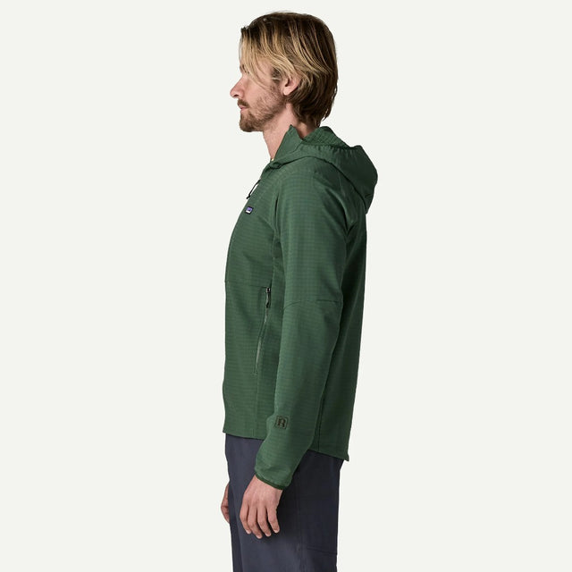 Side on-model view of Patagonia Men's R1 TechFace Hoody in Canopy Green colour
