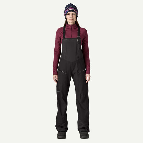 Front on-model view of Patagonia's Snow Drifter Bibs for women in black colour