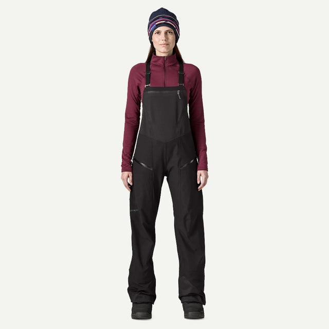 Front on-model view of Patagonia's Snow Drifter Bibs for women in black colour