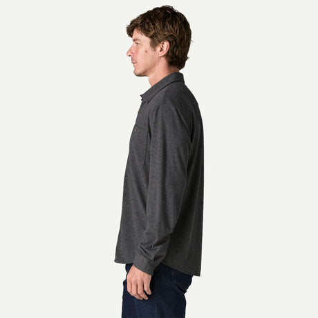 Side on-model view of Patagonia's Men's Stretch Fjord Flannel Shirt in Whole Knit: Forge Grey colour