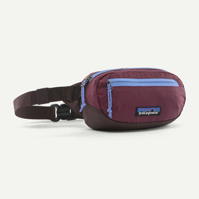 Front view of Patagonia's Terravia Mini Hip Pack 1L in Berry Fig colour