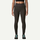 Front view on-model of Patagonia's women's terravia peak tights in black colour