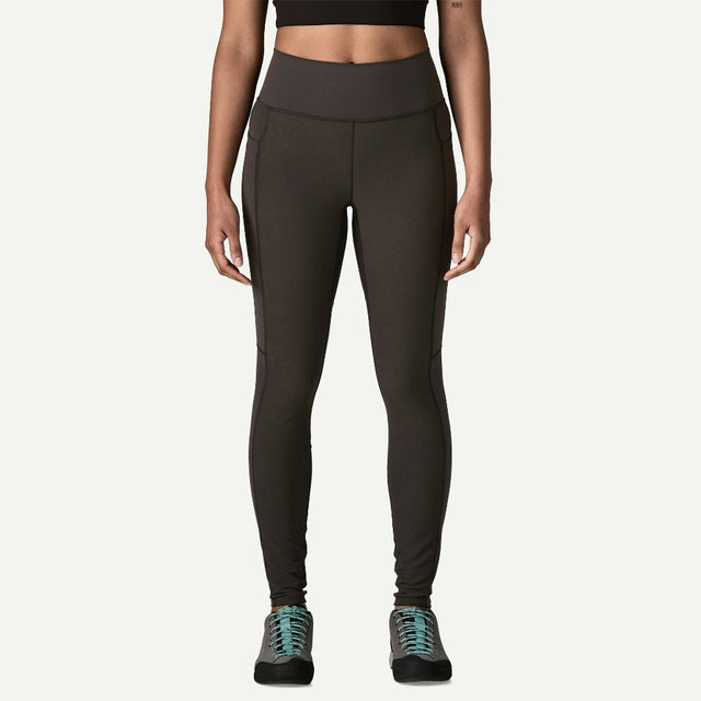Front view on-model of Patagonia's women's terravia peak tights in black colour