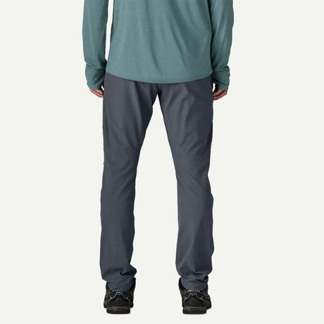 Back on-model view of Patagonia Terravia Trail Pants men's in smolder blue colour