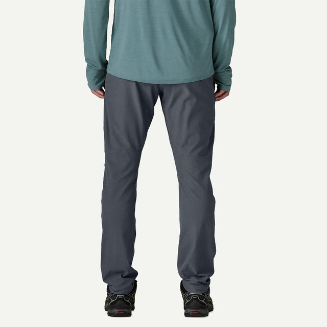 Back on-model view of Patagonia Terravia Trail Pants men's in smolder blue colour