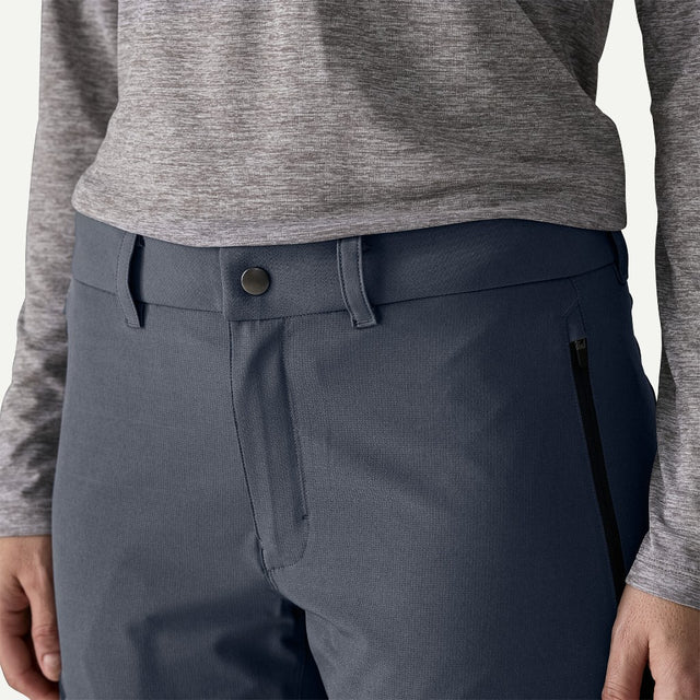 Button detail view of Patagonia Terravia Trail Pants women's in smolder blue colour