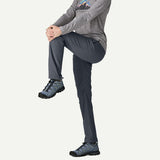 Stretch detail on-model of Patagonia Terravia Trail Pants women's in smolder blue colour