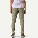 Back view on-model of Patagonia's women's terrebonne joggers in river rock green colour