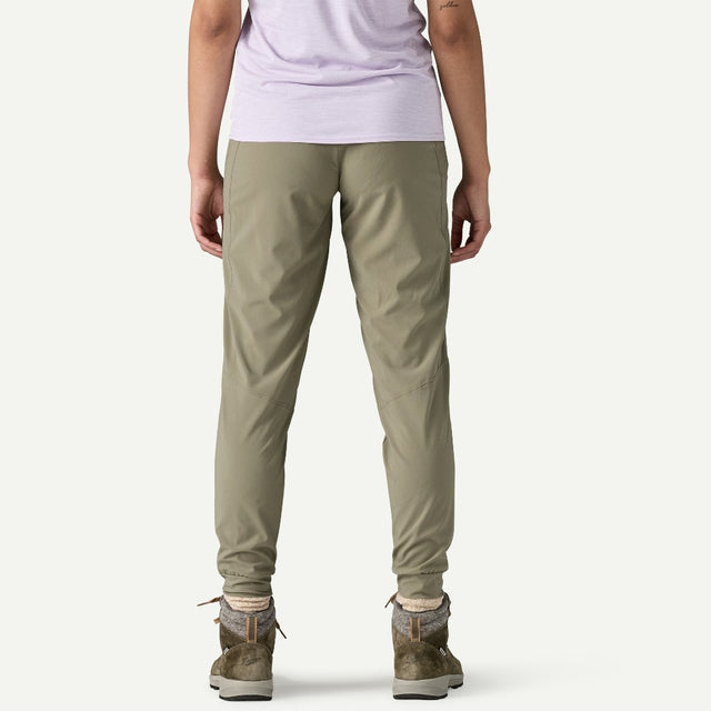 Back view on-model of Patagonia's women's terrebonne joggers in river rock green colour