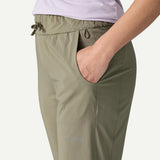 Pocket detail view on-model of Patagonia's women's terrebonne joggers in river rock green colour