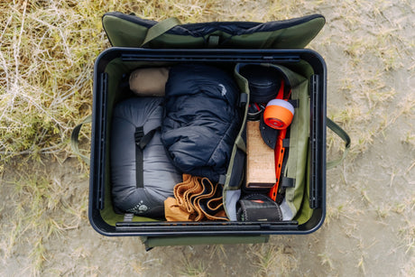 Open RUX gear box with camping gear packed inside