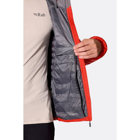 Pocket on-model view of Rab Microlight Alpine Hoody men's in red colour