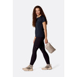 Packed on-model view of Rab Microlight Alpine Hoody women's in galaxy blue colour