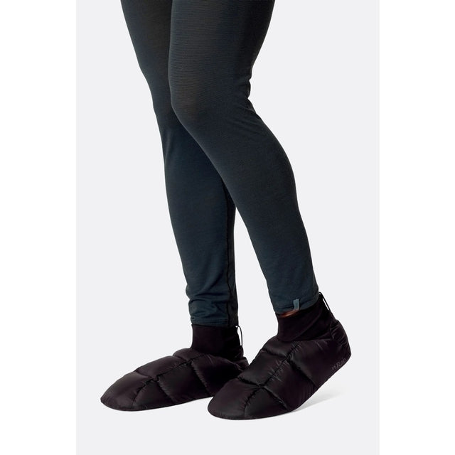 On-model view of Rab Microlight Hut slippers in black colour