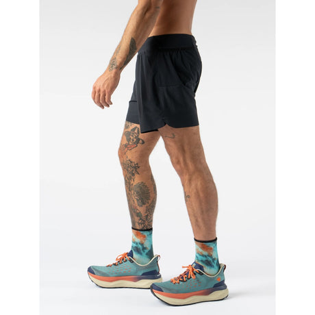 Side on-model view  of Rabbit FKT 5" men's shorts in black colour
