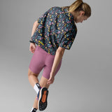 Back view of Rabbit's high country relaxed SS women's shirt in shaded meadow colour