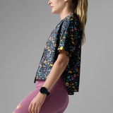 Side view of Rabbit's high country relaxed SS women's shirt in shaded meadow colour