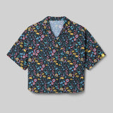 Front view of Rabbit's high country relaxed SS women's shirt in shaded meadow colour