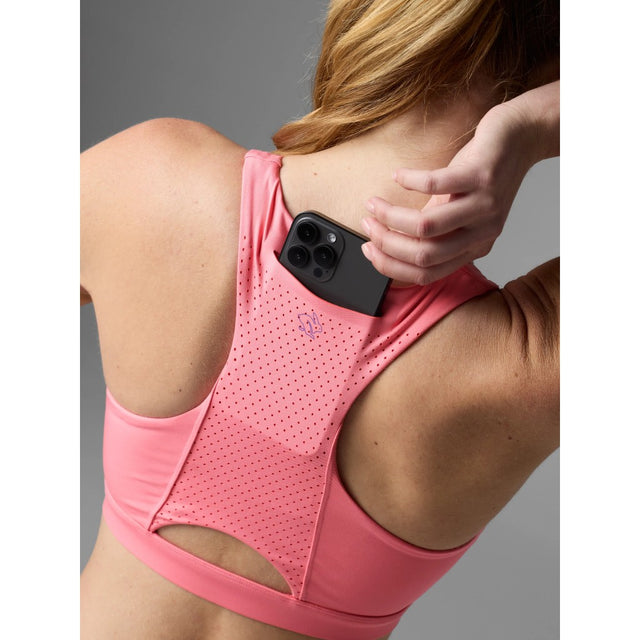 Back on-model pocket view of rabbit's strappy pocket bra in strawberry pink colour