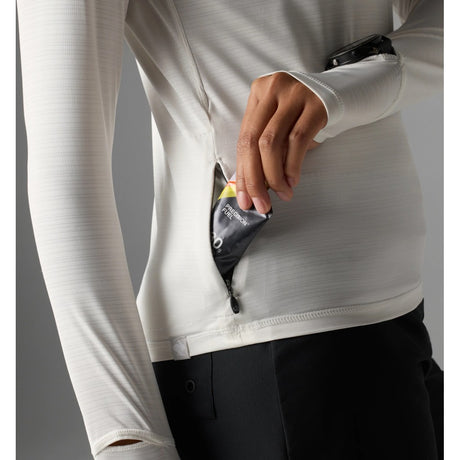 Pocket detail view of women's rabbit UPF Deflector 2.0 pullover in snow white colour