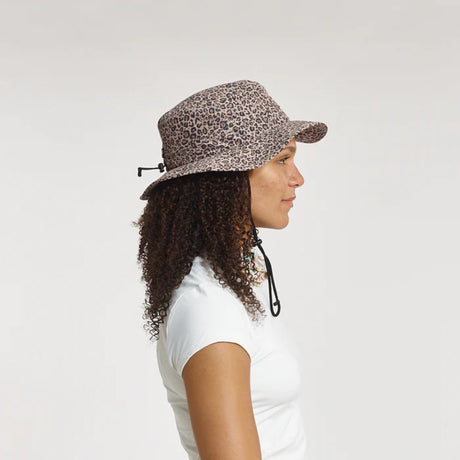 Side view of model in Skida Sun Hat in Wild Thing colour