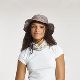 Front view of model in Skida Sun Hat in Wild Thing colour