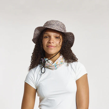 Front view of model in Skida Sun Hat in Wild Thing colour