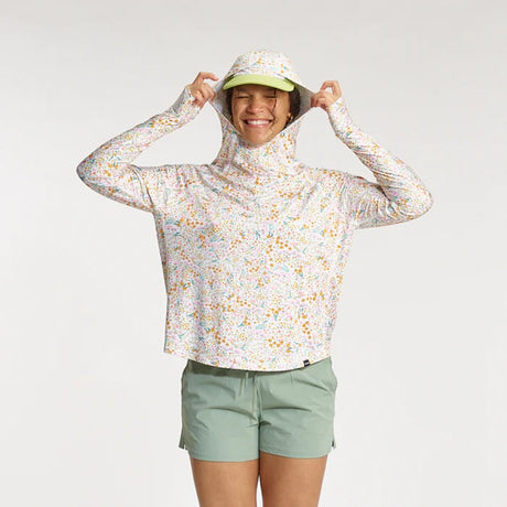 Front view of model in Skida sun shirt in elysian field colour