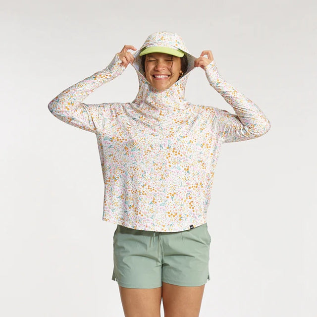Front view of model in Skida sun shirt in elysian field colour
