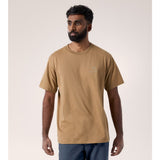 Front on-model view of men's Arc'teryx Kragg SL cotton climbing shirt in canvas colour