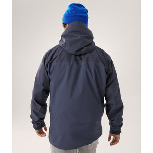 Back on-model view of men's Arc'teryx Beta AR Jacket in black sapphire colour (navy)