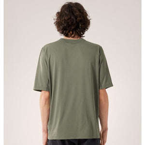 Back on-model view of men's forage heather (green) Arc'teryx Cormac t-shirt