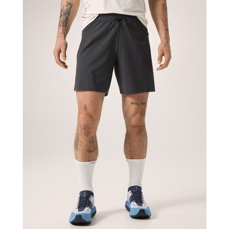 Front on-model view of men's black Arc'teryx Norvan 7" running shorts