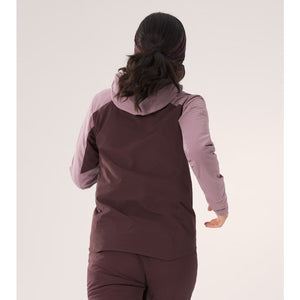 Back on-model view of women's Arc'teryx Norvan Insulated Hoody in Interstellar/Phantasm colour