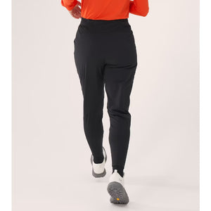 Back on-model view of women's black Arc'teryx Norvan Insulated pants