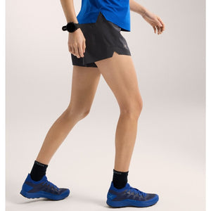 Side on-model view of women's black Arc'teryx Norvan 3" shorts