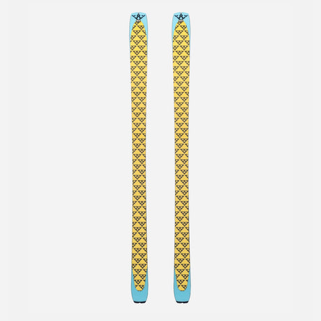 Pair of yellow/black Black Crows touring skins on a pair of skis