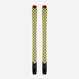 Pair of yellow/black Black Crows touring skins on a pair of Camox skis