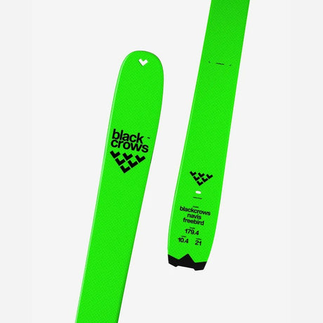 Tip and tail details of a green Black Crows Navis Freebird ski