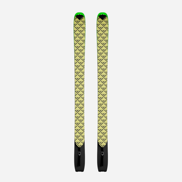 Pair of black/yellow Black Crows touring skins on a pair of skis