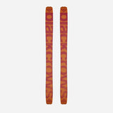 Bottom view of a pair of orange Black Crows Nocta skis