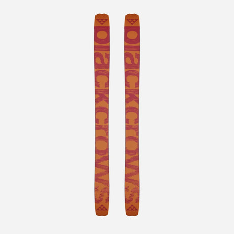 Bottom view of a pair of orange Black Crows Nocta skis