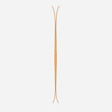 Side view of a pair of orange Black Crows Nocta skis